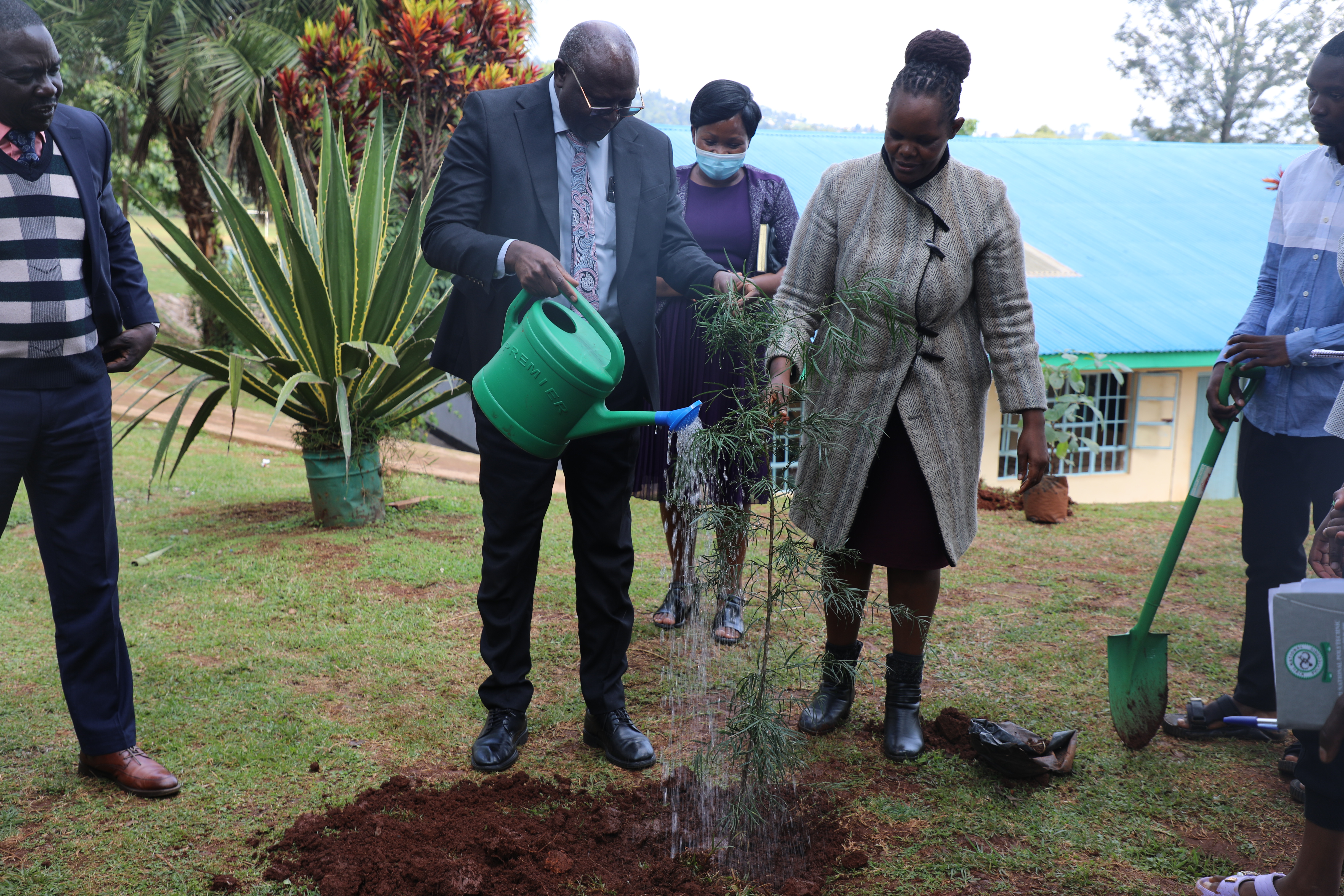Dr. Opwora Planting tree